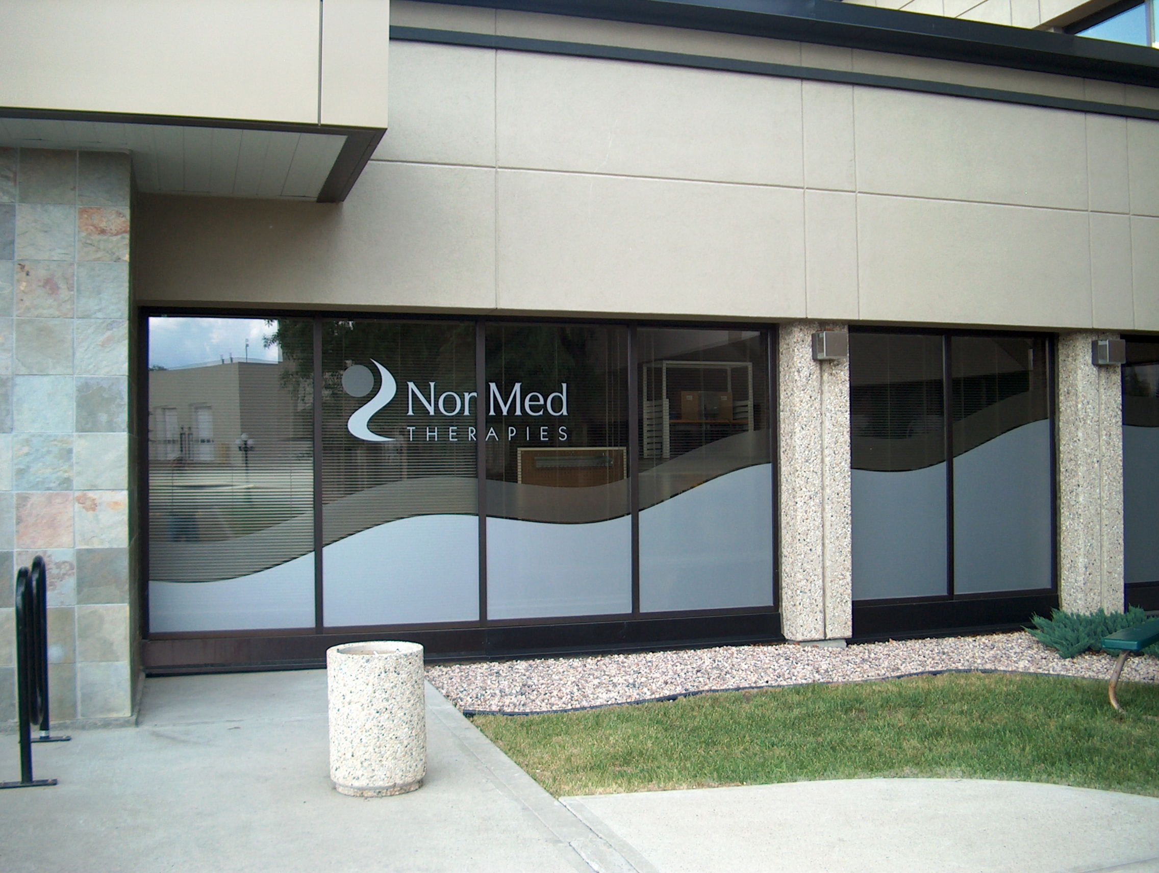 Frosted etched vinyl branding for a Sherwood Park office